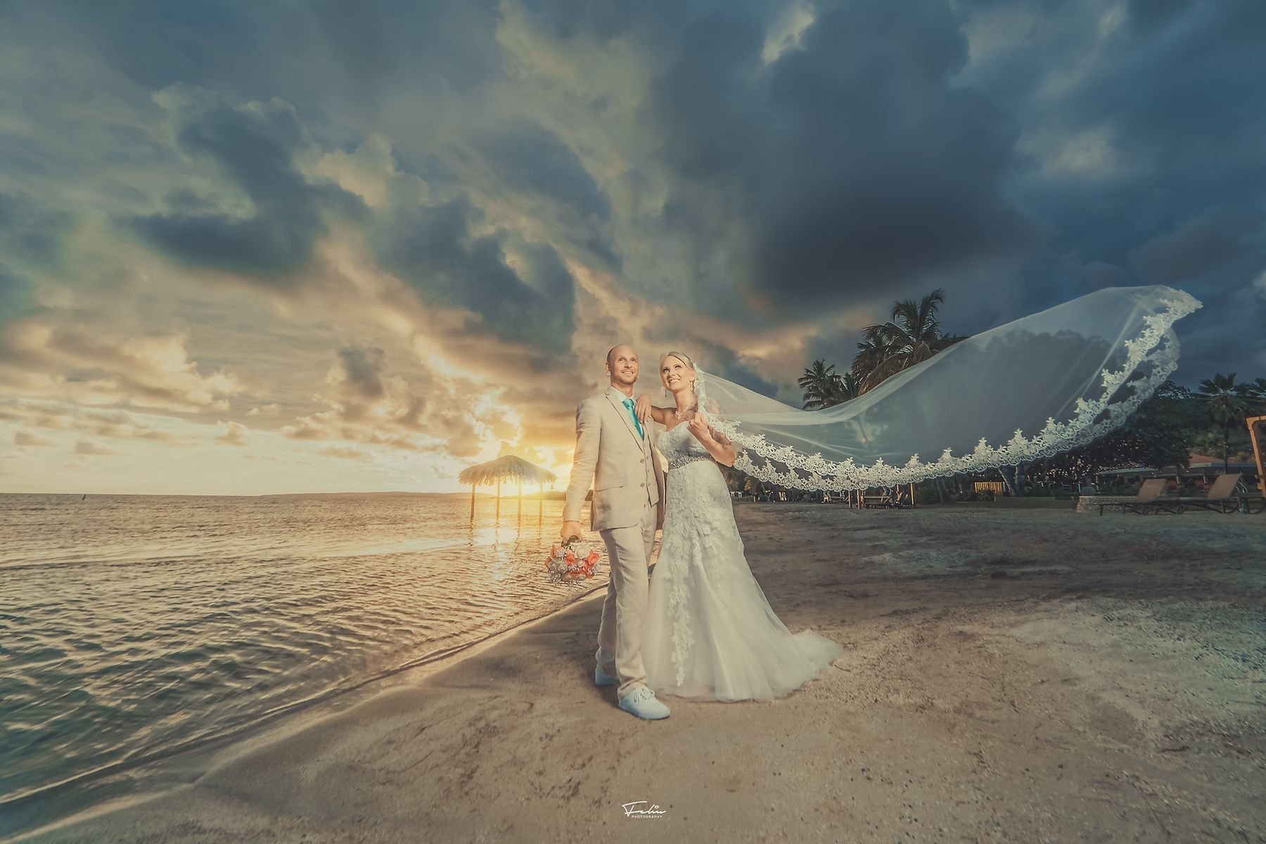 A wedding couple in an outdoor photoshoot at Copamarina