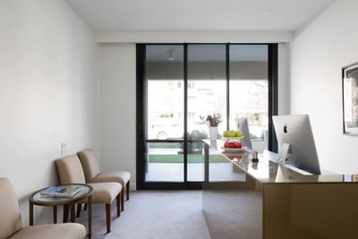 Lobby area with a front desk at Knightsbridge Canberra