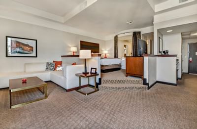 King bed & furniture in a room at Hotel 43