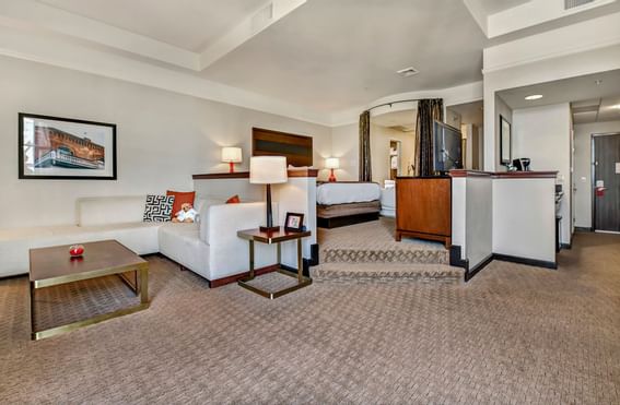 King bed & furniture in a room at Hotel 43
