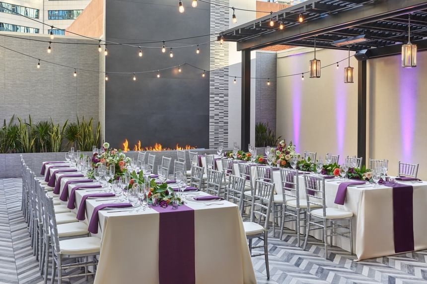 Long tables arranged for an event in Veranda & deck at Hotel Republic San Diego