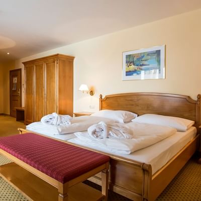 Double bed in Comfort Room at Falkensteiner Hotel Cristallo