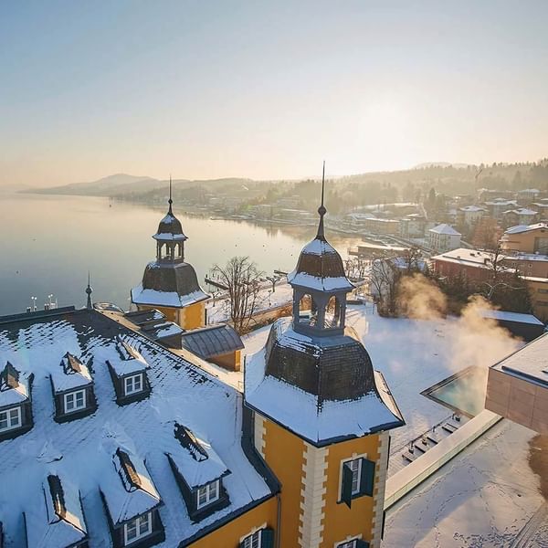 Falkensteiner Schlosshotel Velden top covered with snow near Falkensteiner Spa Resort Mariánské Lázně