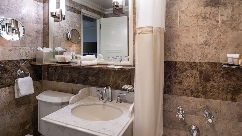 Bathroom lavatory by the vanity area in Junior Suite at Warwick New York