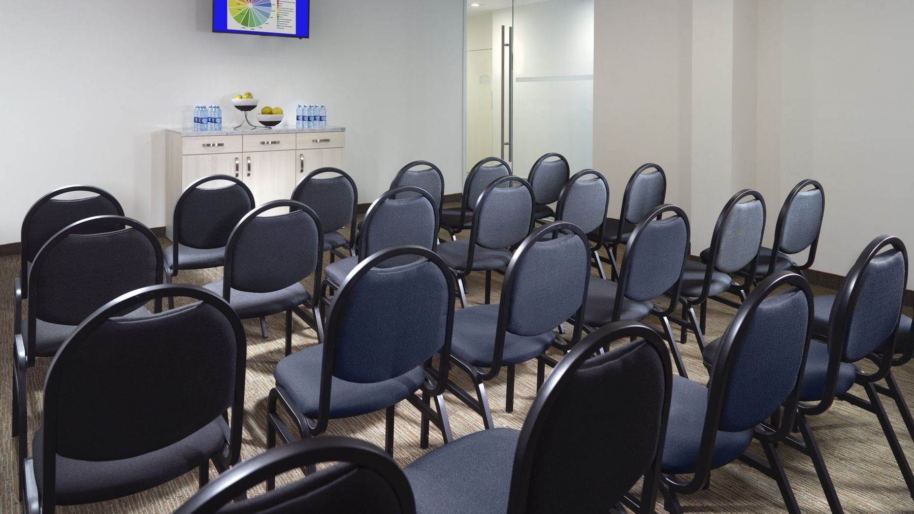 Chair arrangements in a meeting room at One Saltillo Aeropuerto