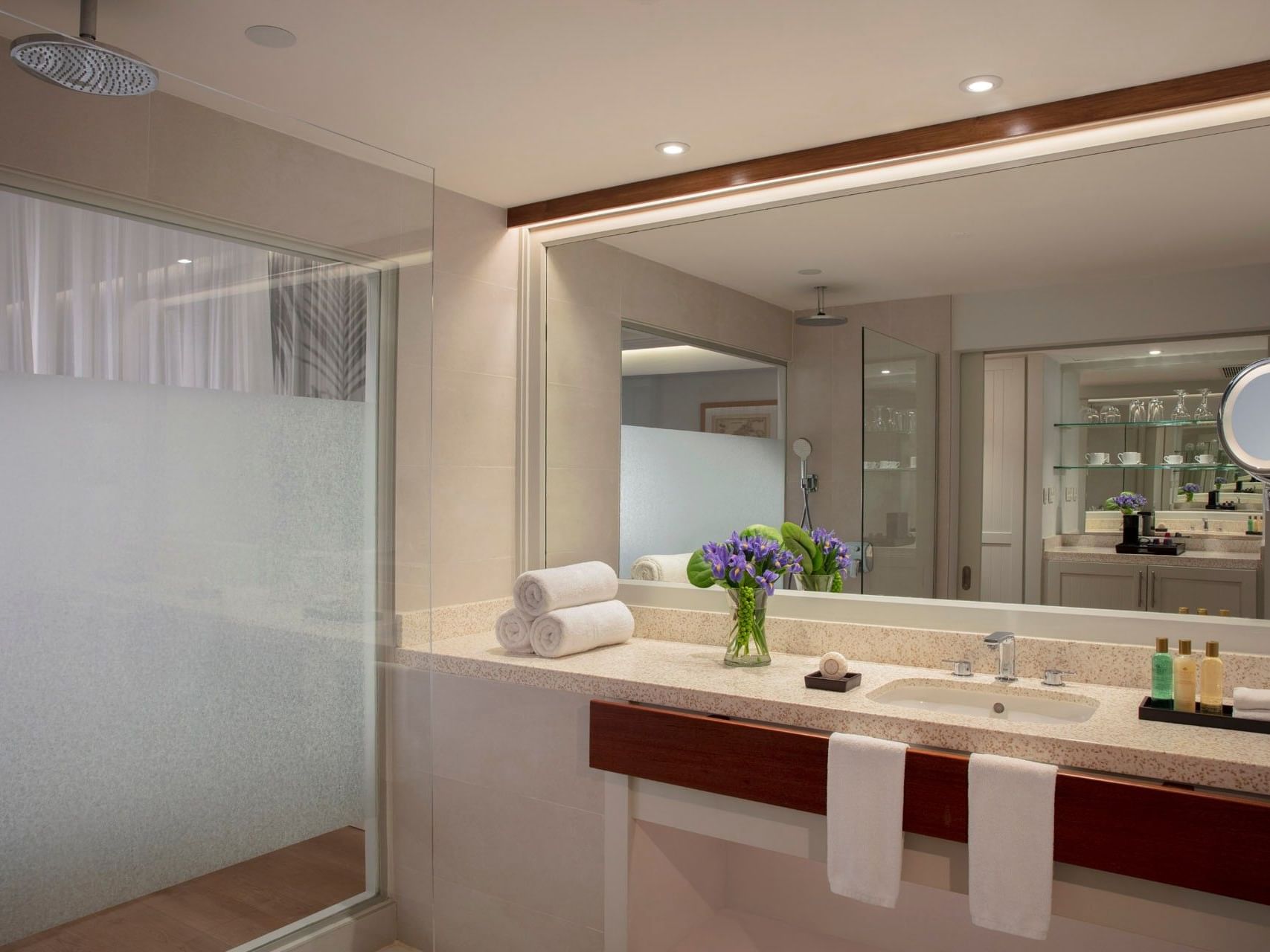Bathroom interior with vanity and shower area in King Bedroom at Saint Martin Beach Resort & Spa