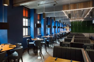 The Dining Area at at the Sandman Signature Aberdeen Hotel with 