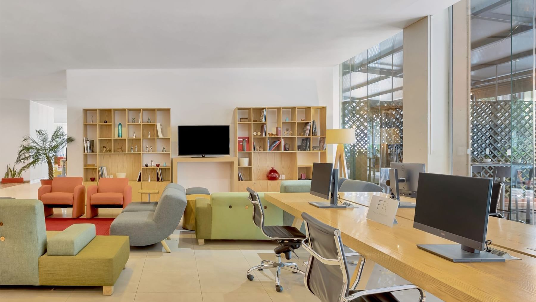 Lounge, TV lobby with working tables in Fiesta Inn