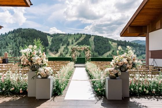 Flower decors in a walkway of an outdoor wedding at Stein Lodge