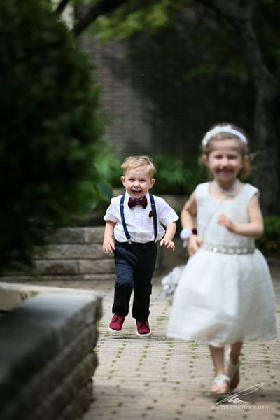kids in the courtyard running at The Inn of Waterloo