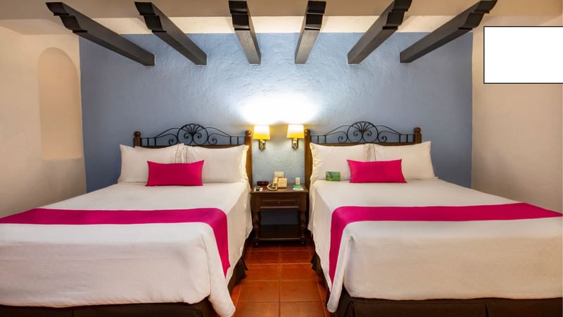 Room with two beds at Gamma Mérida el Castellan