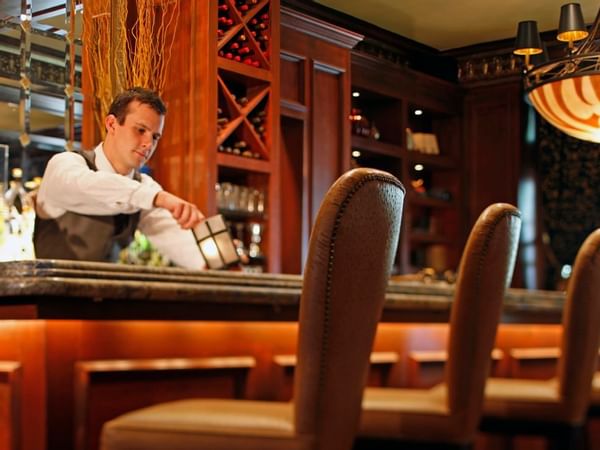 A bartender of the Library Bar at Warwick Melrose Dallas