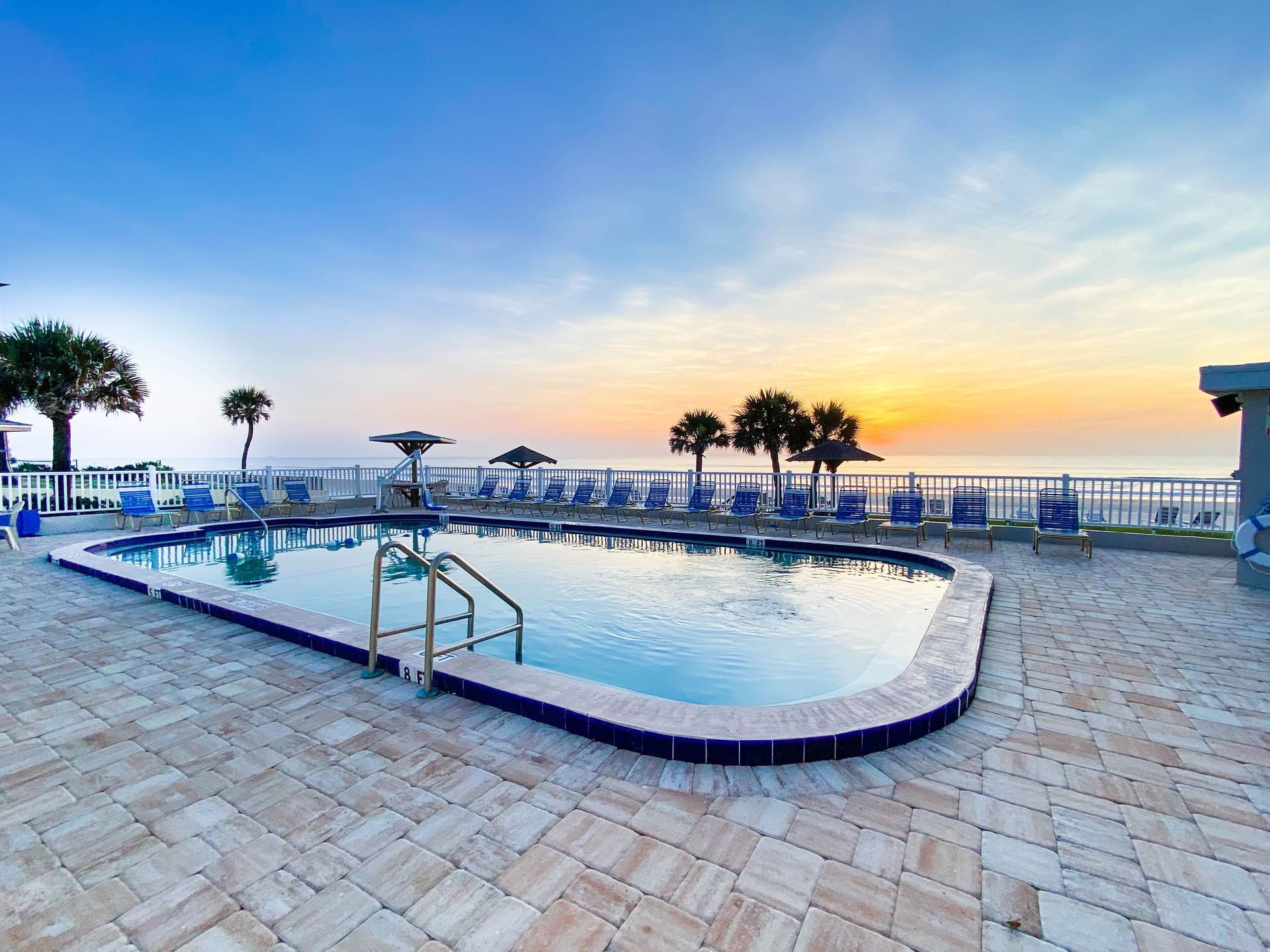 Evening View of Outdoor pool at Ocean Court Beachfront Hotel