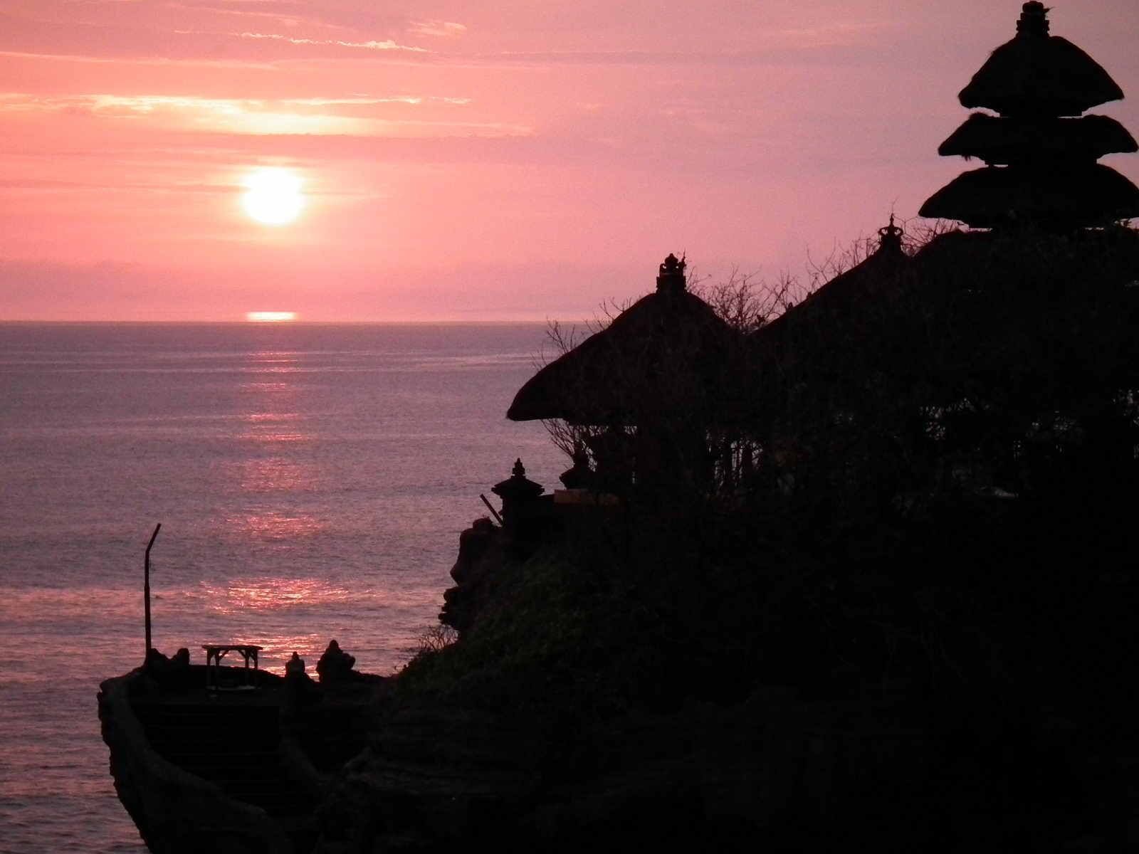 Tanah Lot Temple at sunset near U Hotels & Resorts