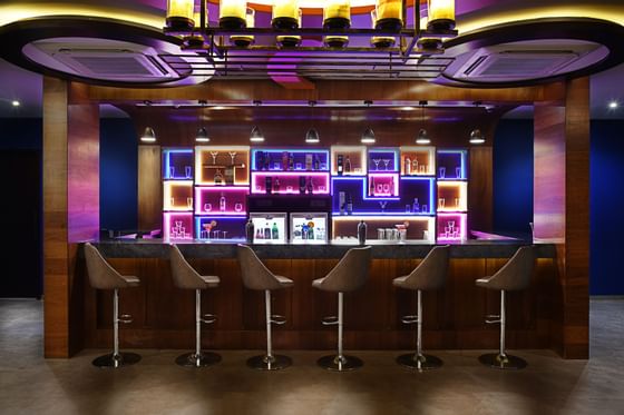 Madira moksh bar area with bar stools at Eastin hotel
