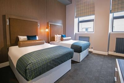 A room at the Sandman Signature Aberdeen Hotel with one two doub