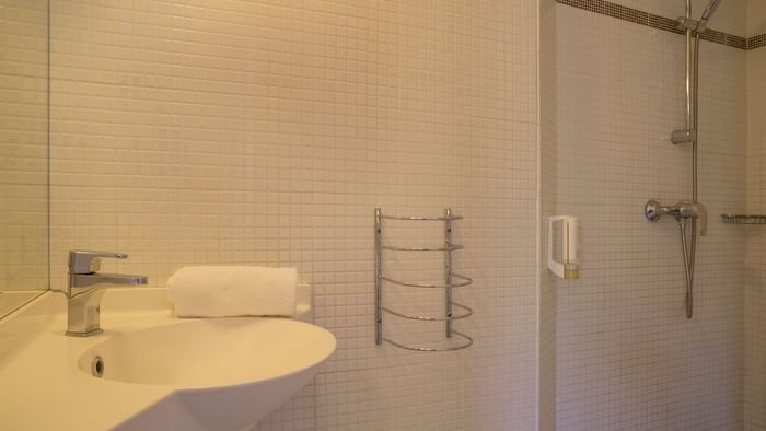 Bathroom vanity in room at Hotel Novella Confort Nantes East