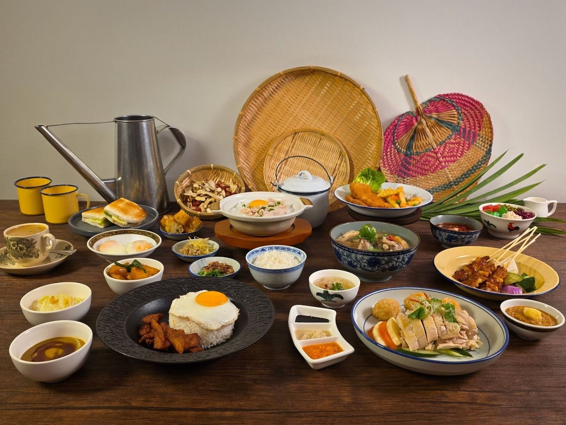 Sumptuous spread of traditional Singaporean and Asian dishes elegantly presented in White Rose Café at York Hotel Singapore