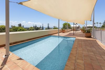 Private rooftop  pool with covering at Nesuto Hotels