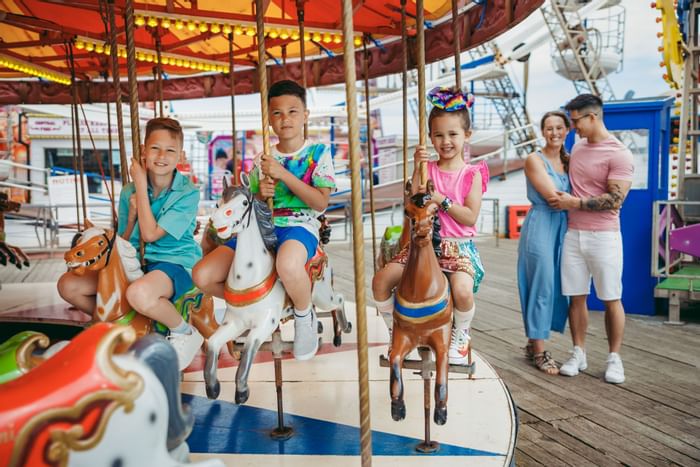 Kids enjoying a ride on carnival, The Imperial Hotel Blackpool