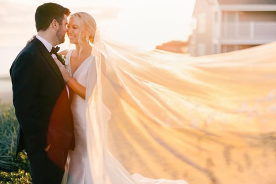 A newlyweds posing to a picture at Pelham on Earle