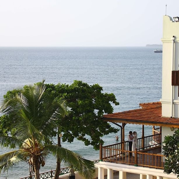 A couple in the hotel room balcony at Zanzibar Serena Hotel