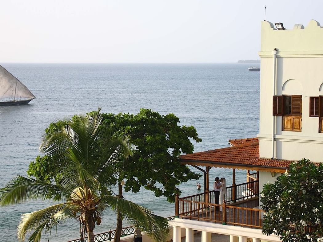 A couple in the hotel room balcony at Zanzibar Serena Hotel