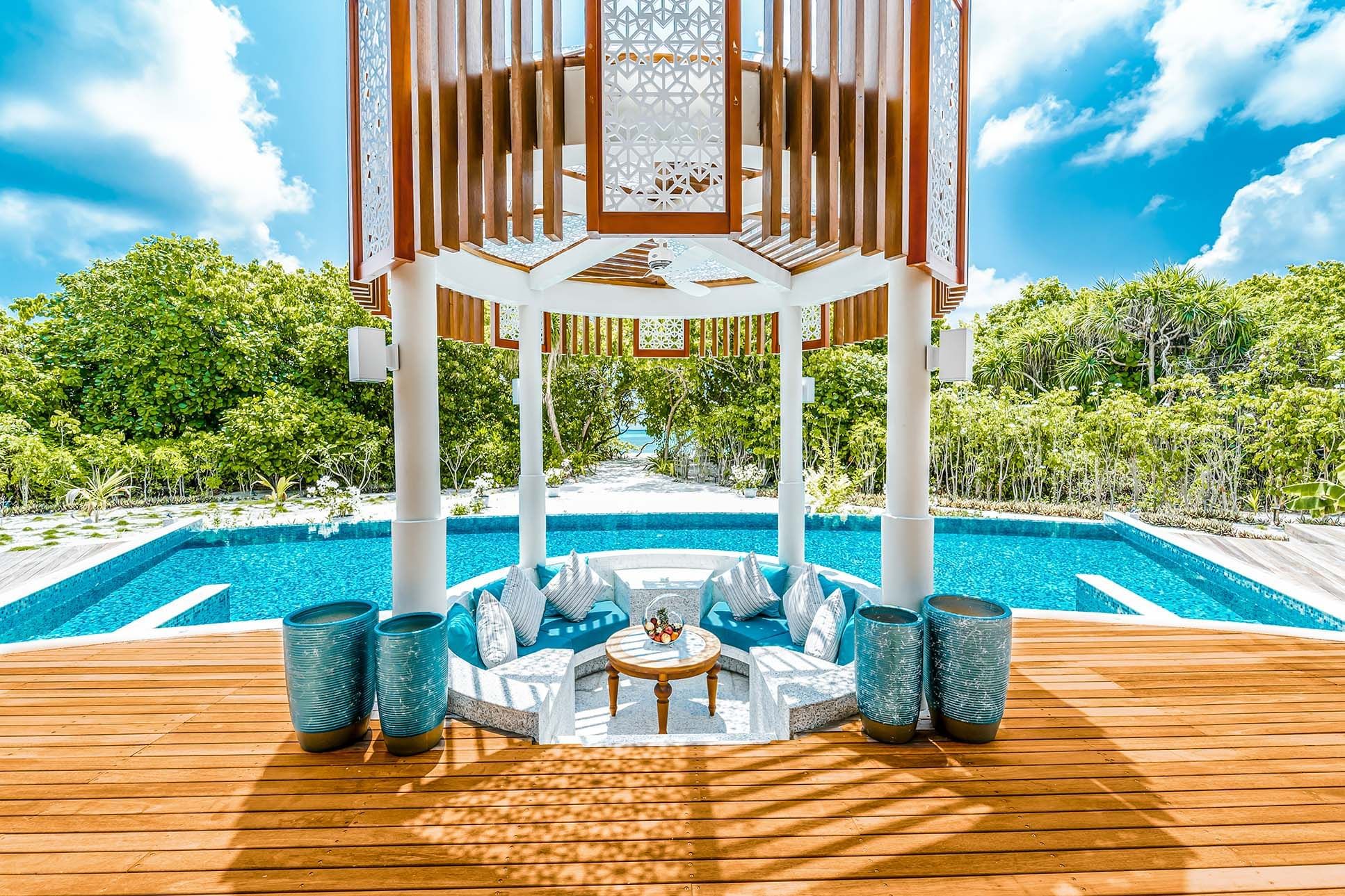 Loungers by the pool at The Signature Collection by Hideaway