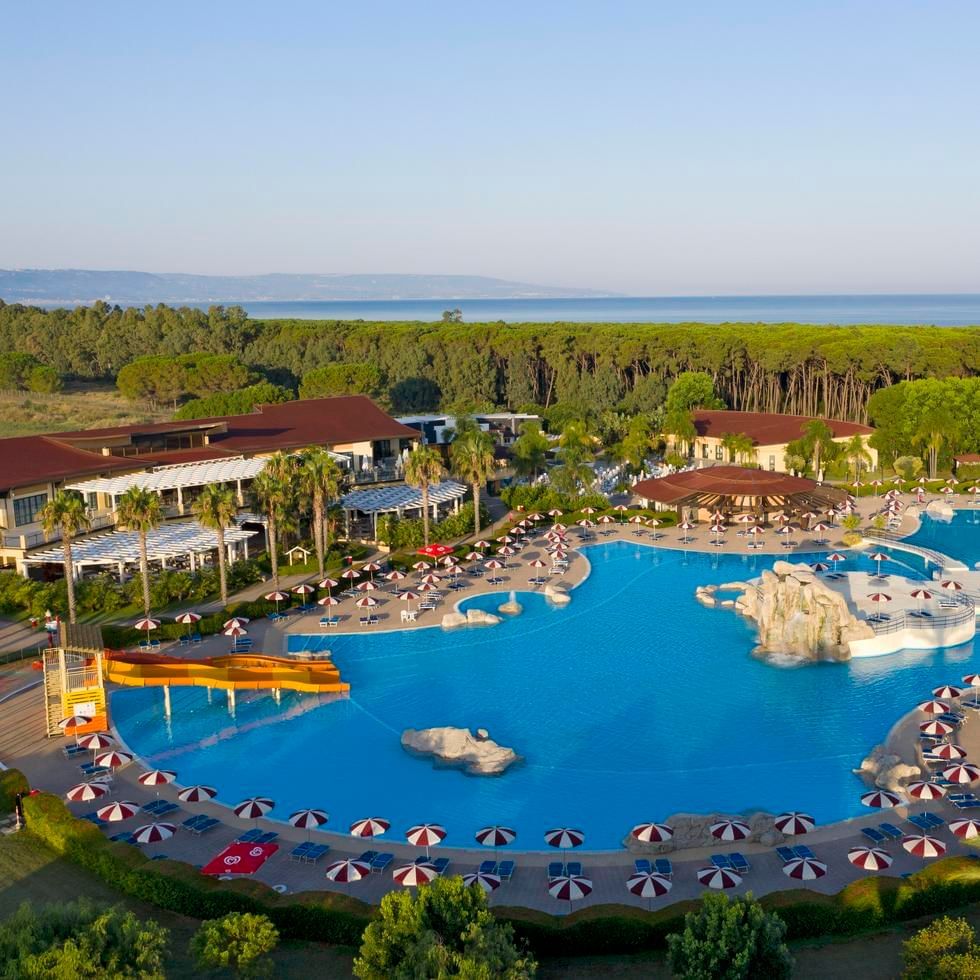 Aerial view of the large pool area at Falkensteiner Hotels