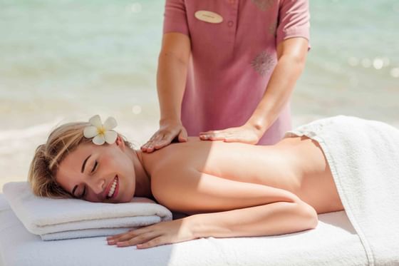 Female guest having a massage at Amatara Wellness Resort Phuket