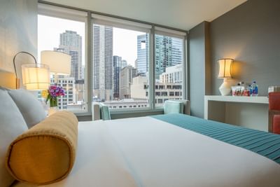 Close-up of a bed in One Bedroom Suite at Kinzie Hotel