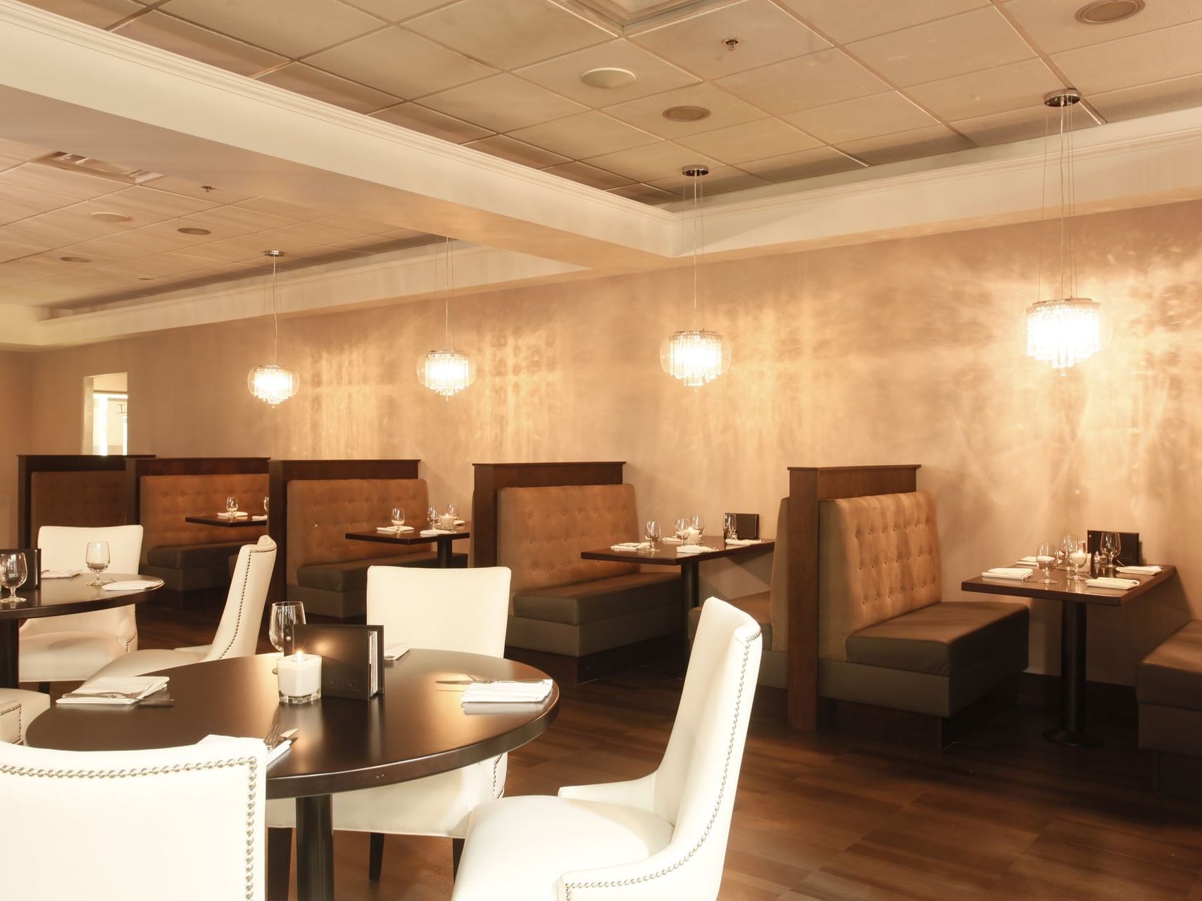 rows of booths and tables in a restaurant