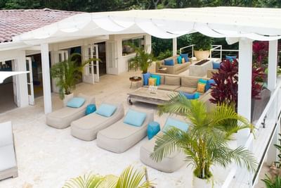 A relaxing area with lounge beds at Retreat Costa Rica