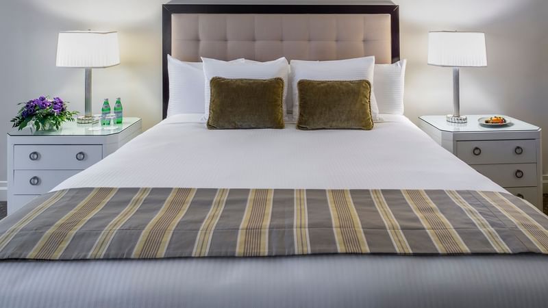 Comfy bed with side tables in Junior Suite at Warwick New York
