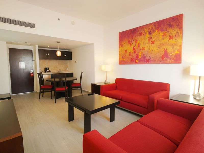 Living area & dining room in Junior Suite at Fiesta Inn