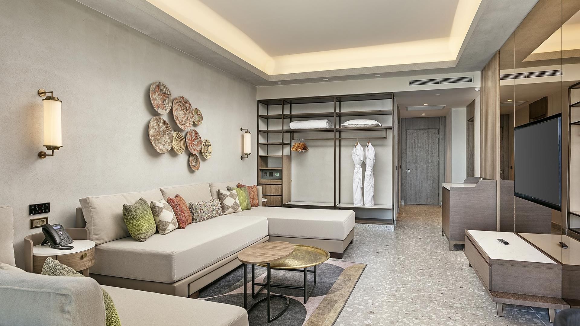 TV lounge area with marble-tilled floor & closet in Grand Family at Cullinan Belek