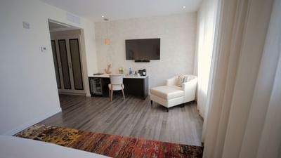 lounge area with couch and television