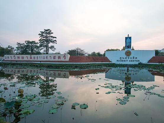 Exterior view of Thammasat University by the lake near Hop Inn Hotel