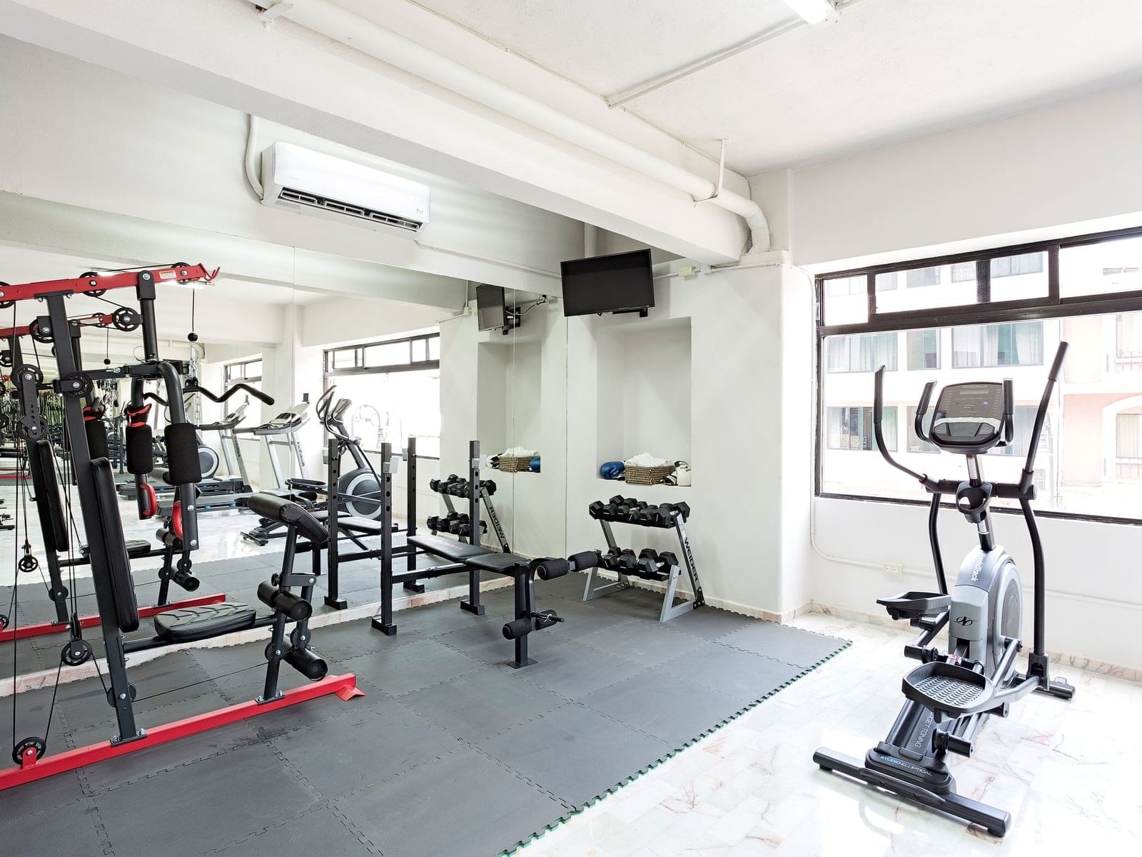 Exercise machines in the fitness center at Gamma Hotels