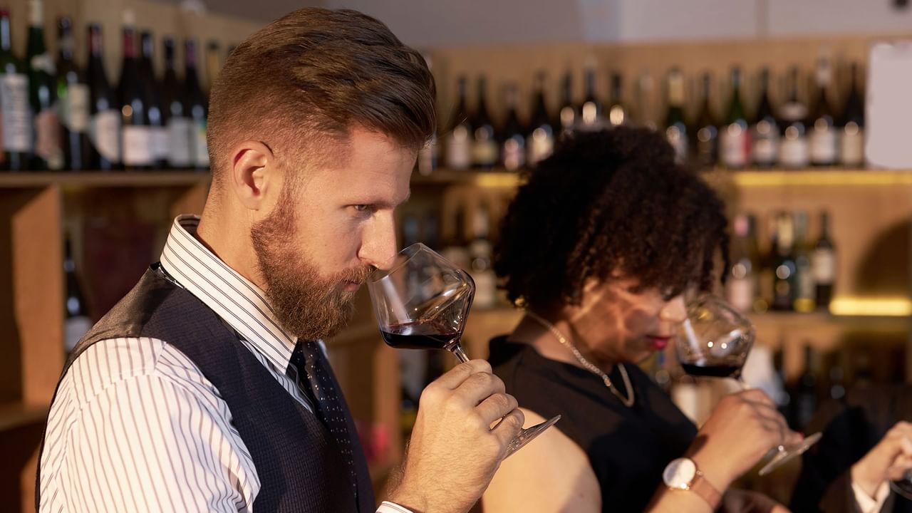 People tasting wine