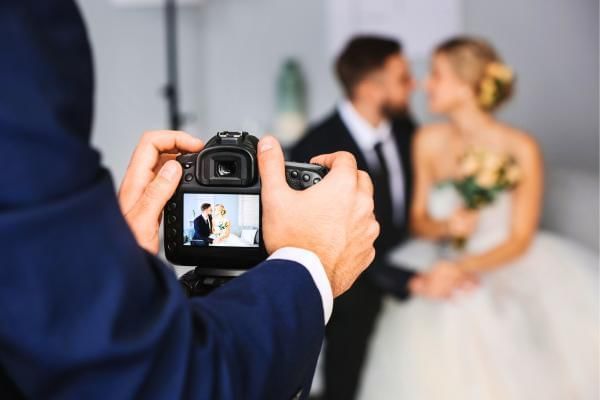 Photographer that bride and groom negotiated costs with taking image of them, a great wedding cost saving tip