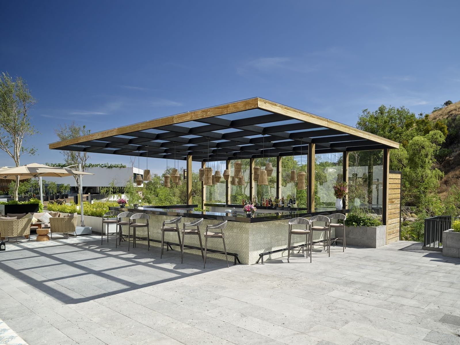 Outdoor bar counter in Mario Canario at La Colección Resorts