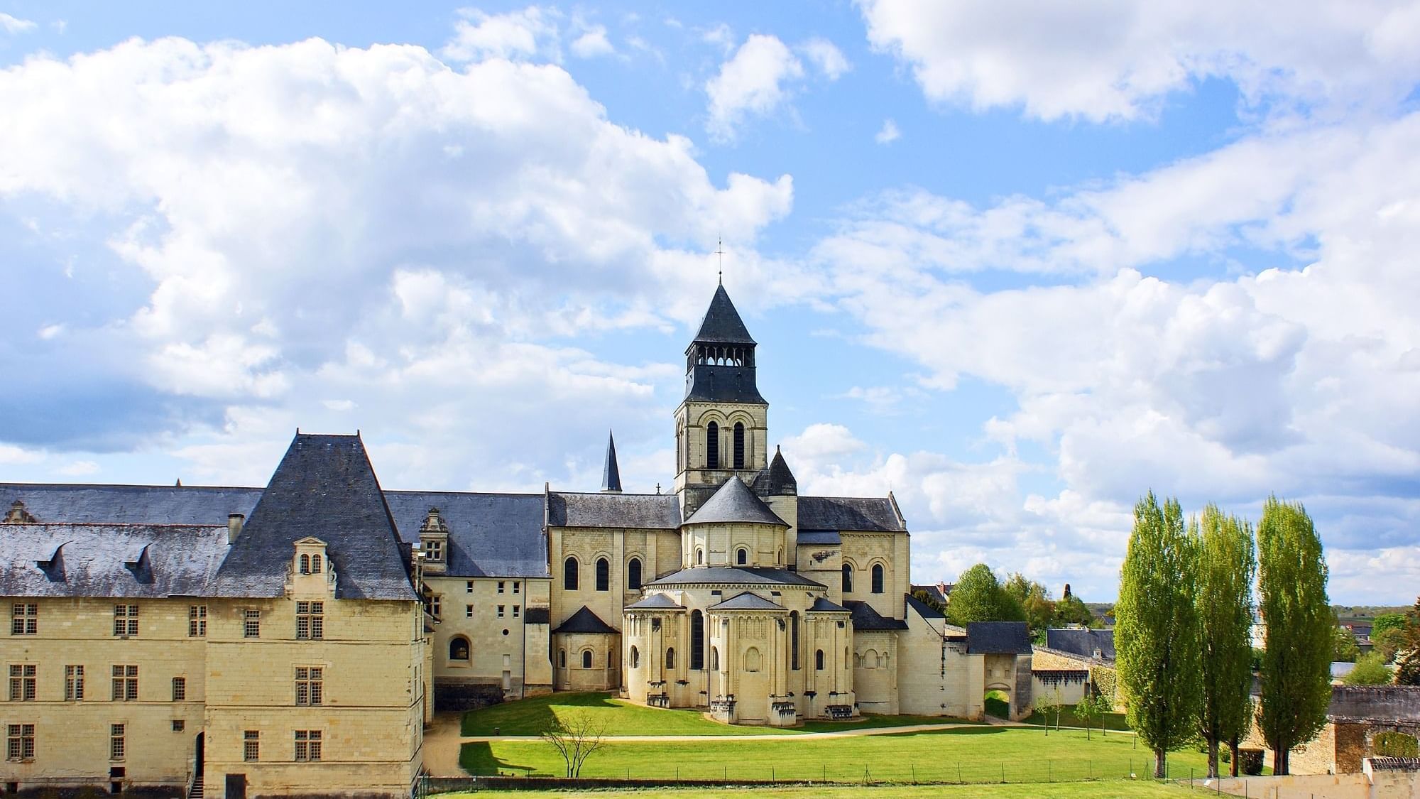 The exterior of Royal Abbey of Fontevraud near Originals Hotels