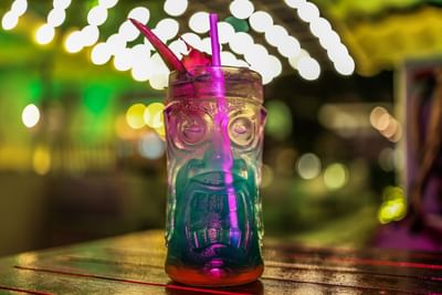 Close-up of a Mojito glass with a face served at Fairwind Hotel Miami