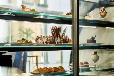 Sweet dessert cakes being displayed in the restaurant of CDC