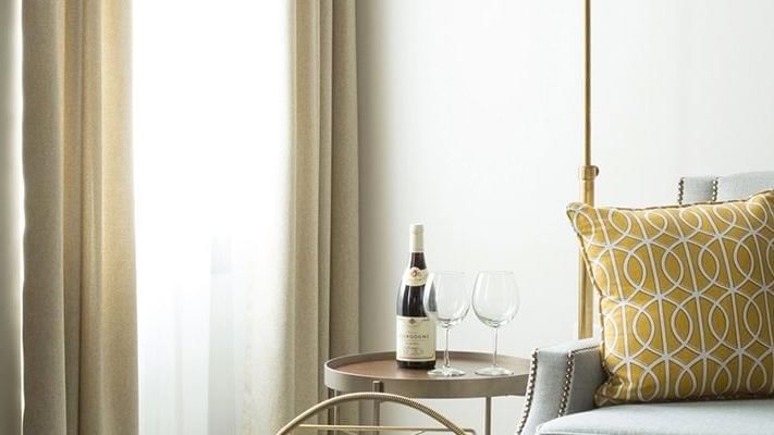 Living area of Balcony Suite at Warwick San Francisco