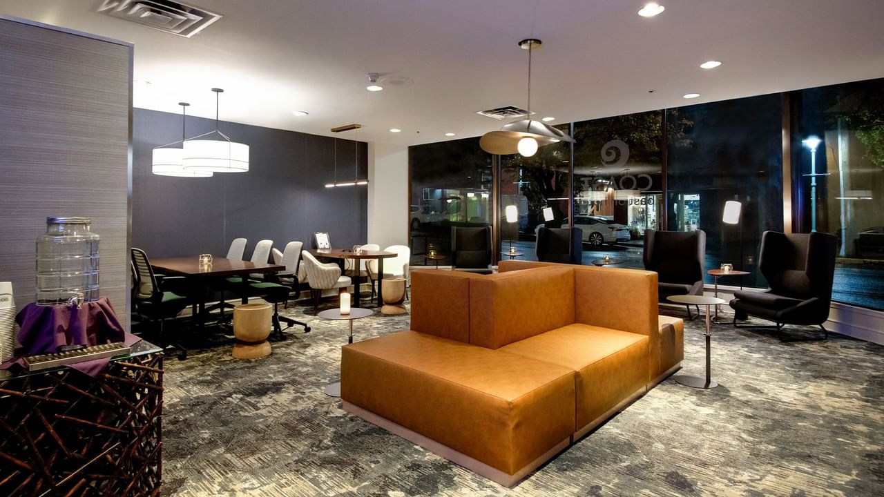 Relax in the hotel guest lounge with cozy seating
