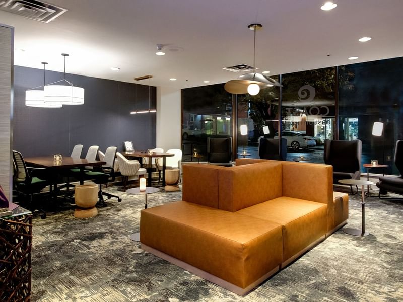 Relax in the hotel guest lounge with cozy seating