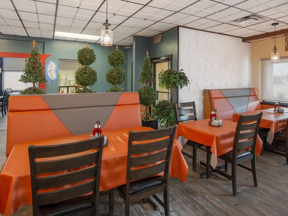 Interior view of Sam’s Friends Kitchen with tables and chairs.