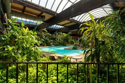 Indoor Courtyard Pool area with a Retractable Roof and Cocktail Service at M Hotel Buffalo